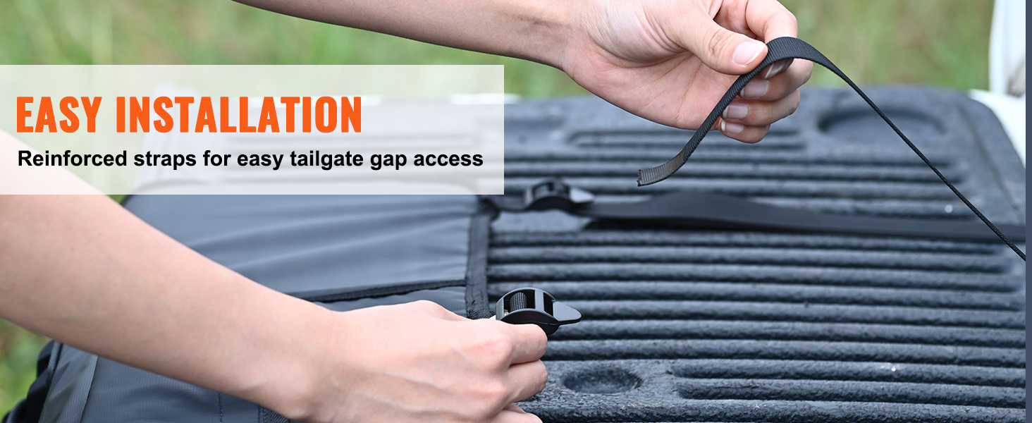 hands adjusting reinforced straps on a VEVOR tailgate pad, showcasing easy installation steps.